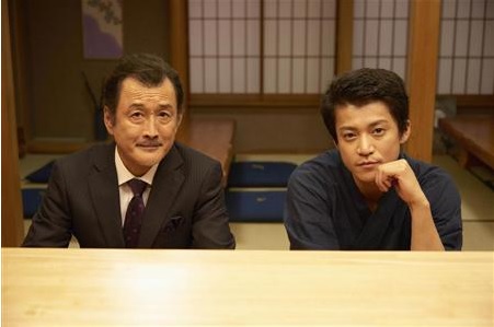 โอกุริ ชุน พ่อค้าโซบะผู้คอยเป็นที่ปรึกษาด้านความรักในเพื่อนทั้งในละครและในชีวิตจริง